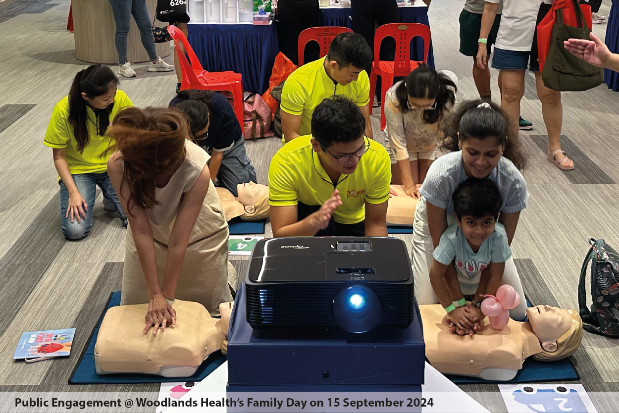 Photo of participants competing in QCPR Race at Woodlands Hospital's Family Day on 15 September 2024.